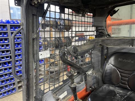 how to remove side widows on a kubota skid steer|kubota window cleaner inside.